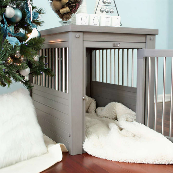 Cozy gray furniture-style dog crate beside a decorated Christmas tree, showing a stylish indoor solution for dog crate problems