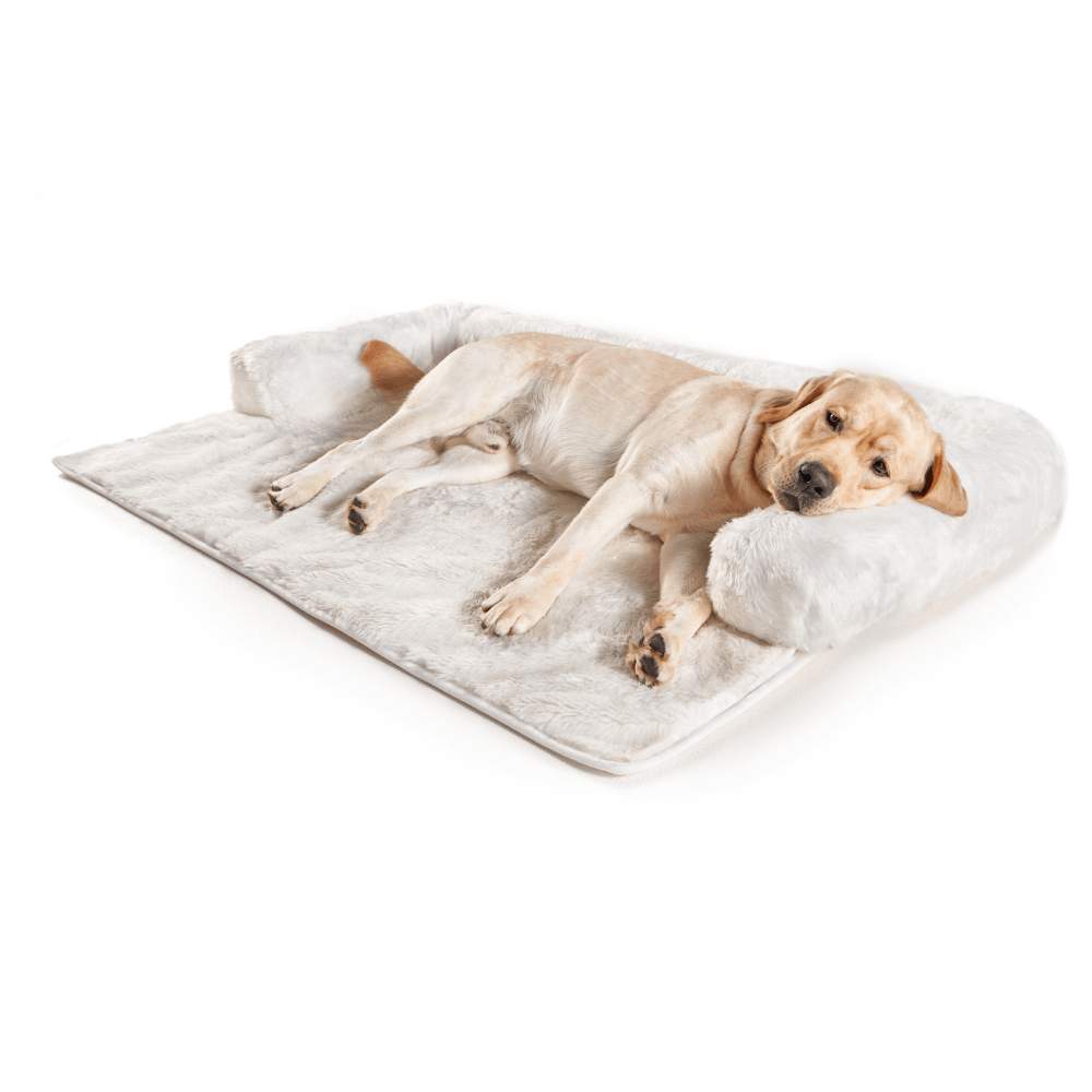 A Labrador is lying down and looking content on the Paw PupProtector™ Waterproof Couch Lounger - Polar White