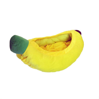 A YML Banana Pet Bed, which is a yellow, banana-shaped pet bed with a green end, designed to provide a cozy and fun resting spot for pets