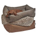 A brown dog naps in a gray fabric Bowsers The Franklin Dog Bed, stacked on top of two others in leopard print and brown