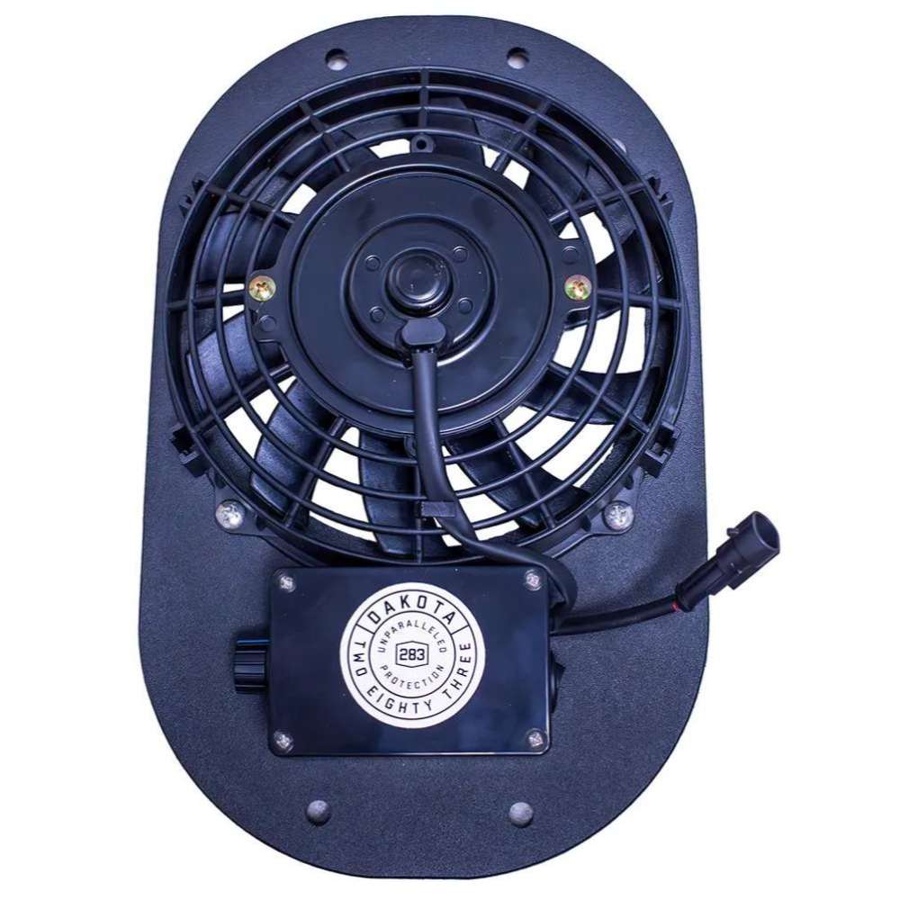 A close-up of the Dakota 283 Dog Crate Ventilation Fan on its mounting plate, featuring the Dakota 283 logo on the control box