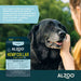 A black dog being petted while wearing the ALZOO Plant-Based Hemp Premium Collar for Dogs