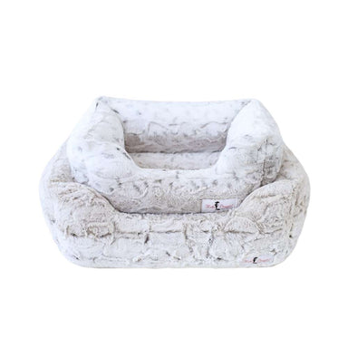 A chic Hello Doggie Deluxe Dog Bed adorned in a pearl leopard print