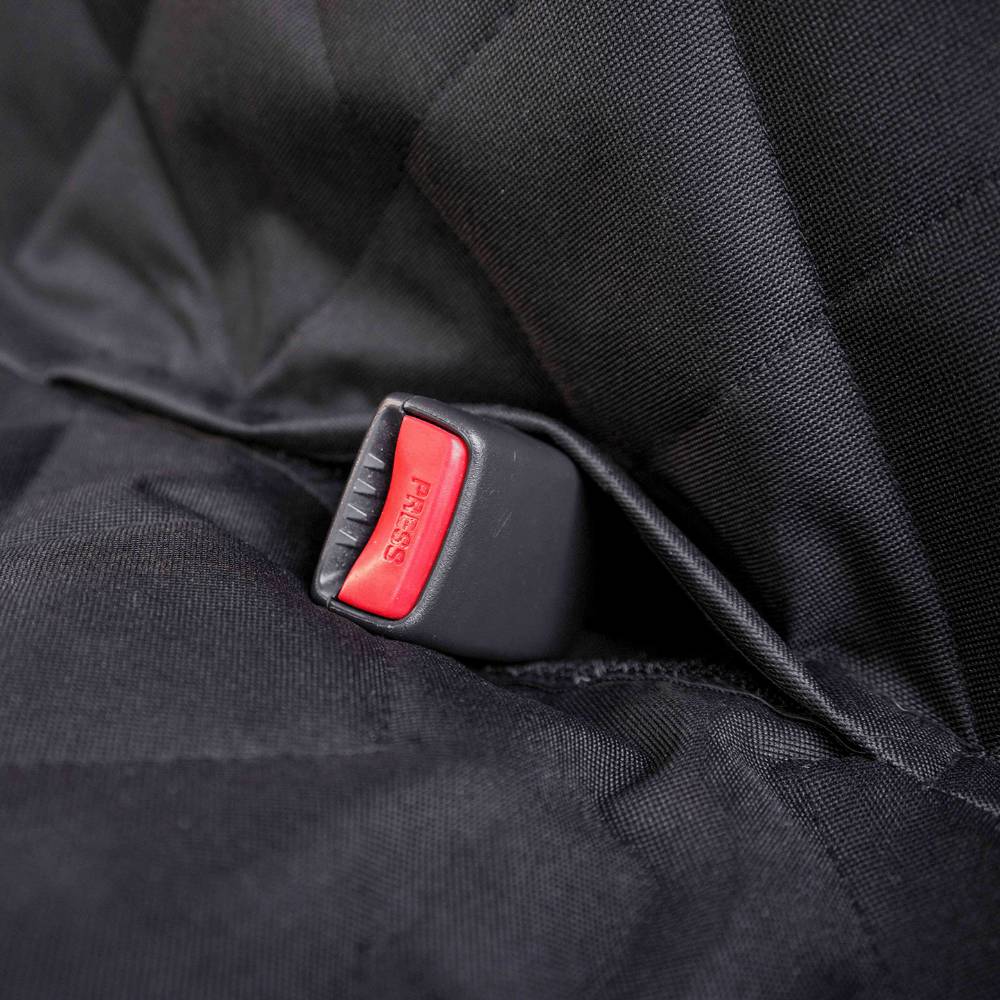 A close-up shot of the seatbelt opening on the Paw PupProtector™ Back Seat Dog Car Cover, designed for easy access and safety