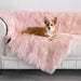 A corgi is lounging on a white couch covered with the Paw PupProtector™ Waterproof Throw Blanket - Blush Pink Luxury Dog Blanket