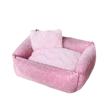 A full view of the Hello Doggie Crystal Dog Bed in pink, featuring a plush, fluffy pillow and a sparkling pink fabric exterior