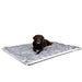 A large dog is resting on the floor on the Paw PupProtector™ Waterproof Throw Blanket - Ultra Plush Arctic Fox
