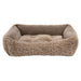 Alpaca Bowsers One Of A Kind Scoop Dog Bed features a fluffy beige exterior and a soft padded center that creates a warm, nest-like space