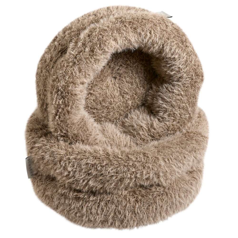 Alpaca Bowsers The Muffy Dog Bed is shown in soft brown faux fur with a hooded, cave-like design that gives pets a cozy enclosed space