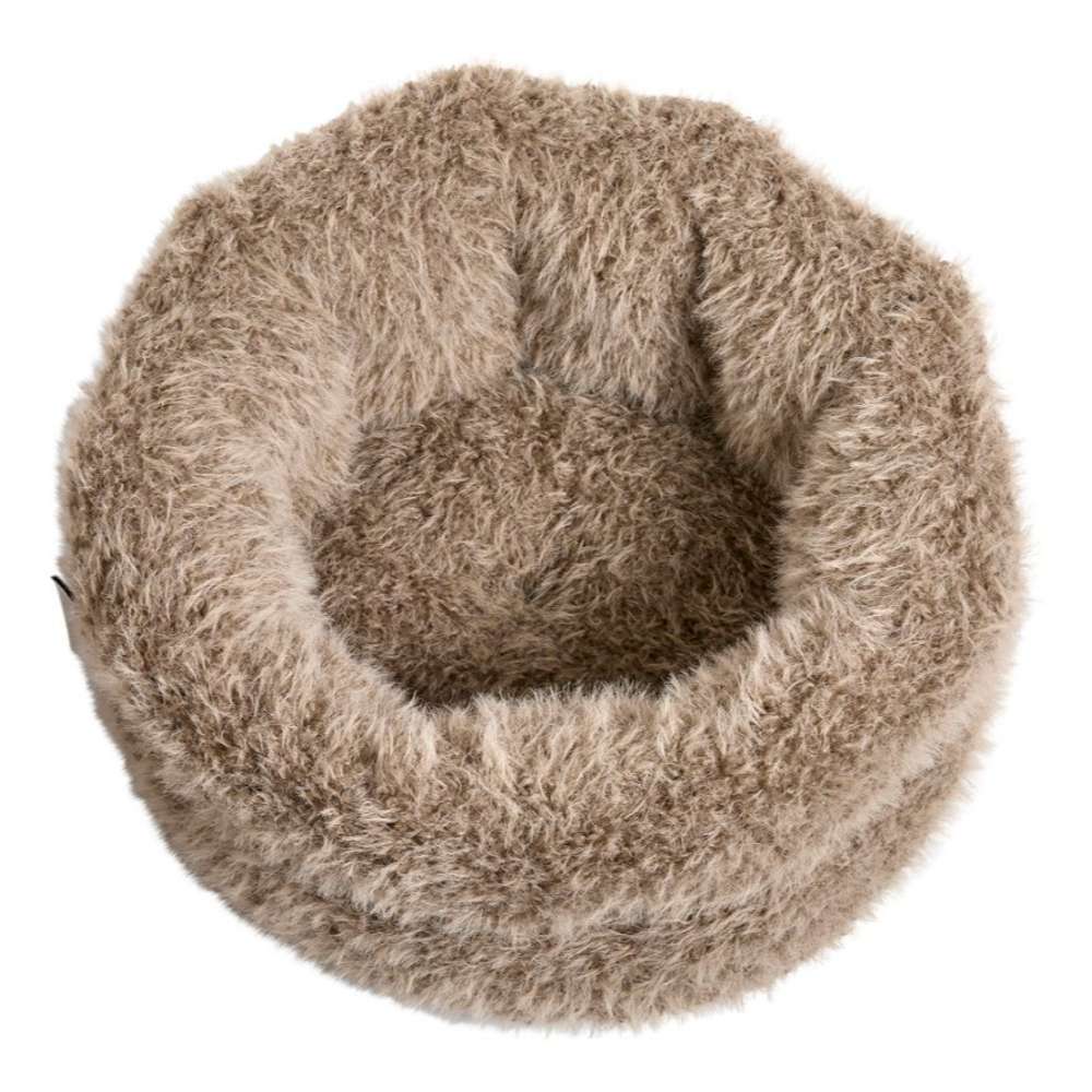 Alpaca Bowsers The Muffy Dog Bed is viewed from above, showing a circular cushioned center surrounded by fluffy bolstered sides