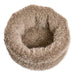 Alpaca Bowsers The Muffy Dog Bed is viewed from above, showing a circular cushioned center surrounded by fluffy bolstered sides