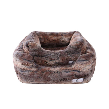 A luxurious Hello Doggie Deluxe Dog Bed covered in a red fox faux fur design
