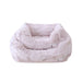A luxurious double-layer dog bed in a blush pink color from the Hello Doggie Luxe Dog Bed collection