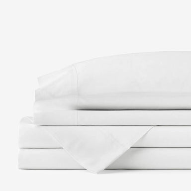 A neatly folded set of white sheets, representing the Paw PupSheets™ Hair Resistant, Antimicrobial, & Cooling Duvet Cover and Sheet Set Bundle - White
