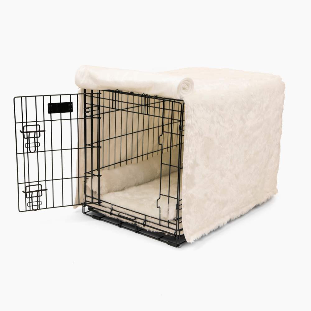 An empty black wire crate with a cozy white cover and interior from the Paw Upgrade Your Dog Crate Kit - Polar White