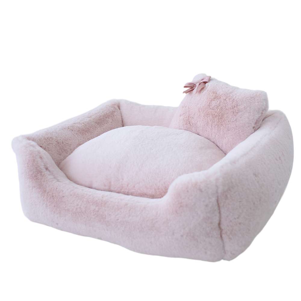 An image features the Hello Doggie Divine Dog Bed in a soft blush color, emphasizing its luxurious and comfortable appearance