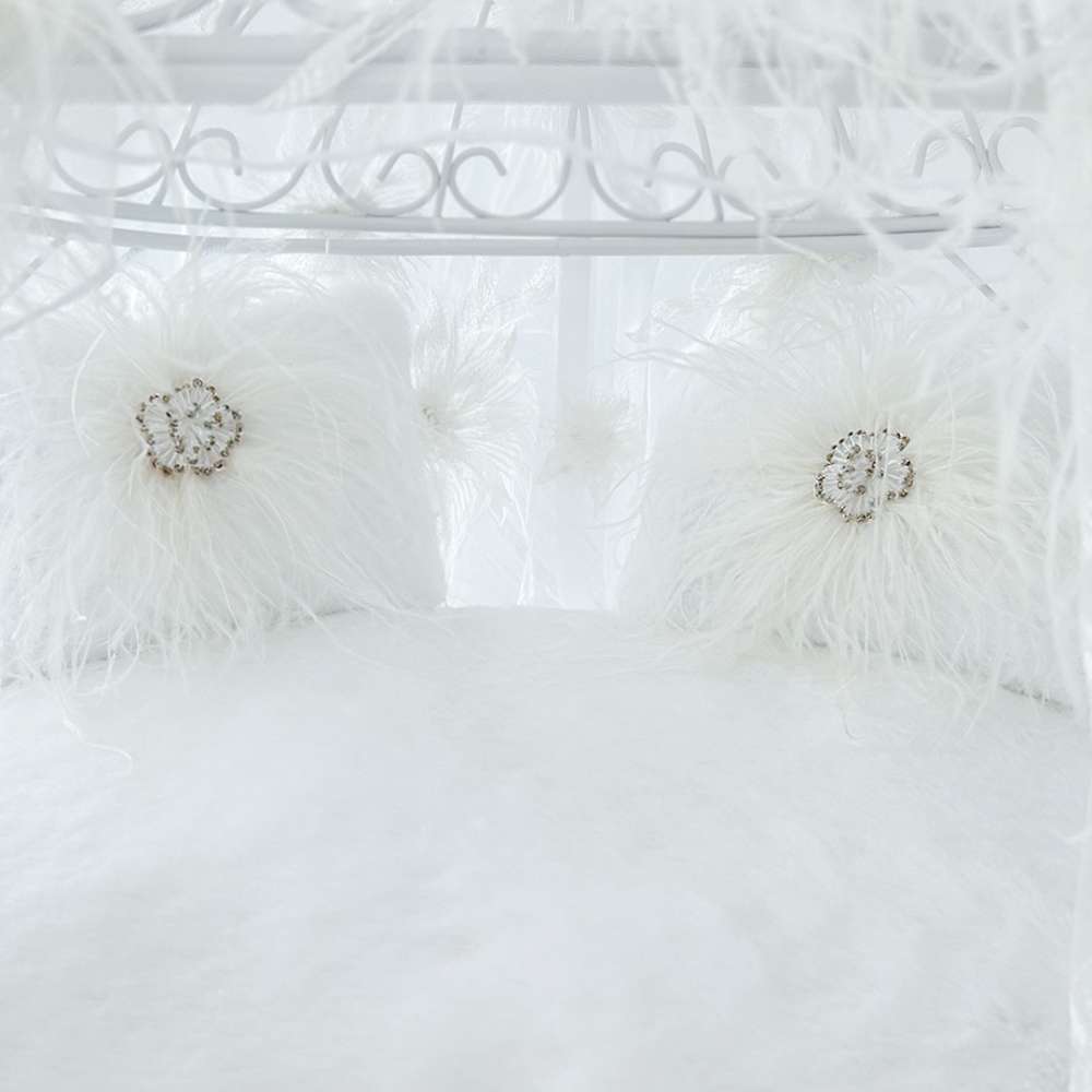 An image provides a close-up of the luxurious, fluffy interior cushioning of the Hello Doggie Prima Donna Dog Carriage