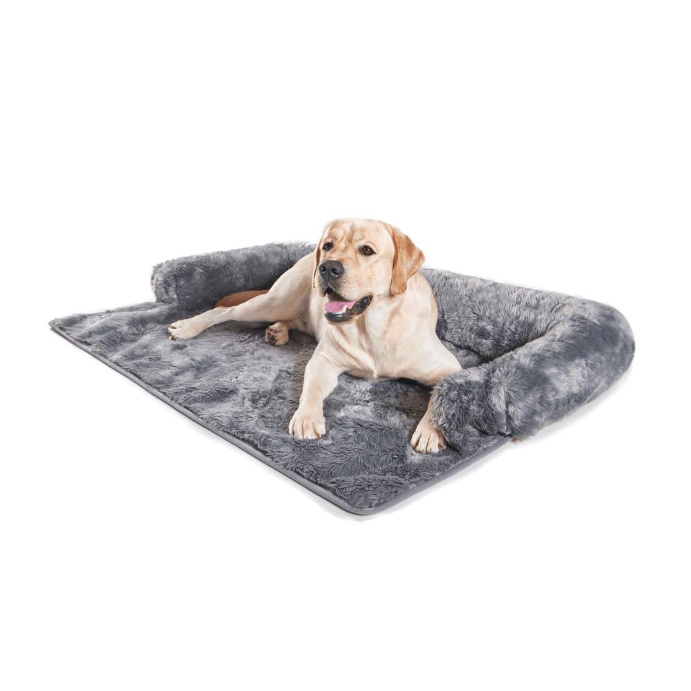 A relaxed Labrador is lying down comfortably on the Paw PupProtector™ Waterproof Couch Lounger - Charcoal Grey