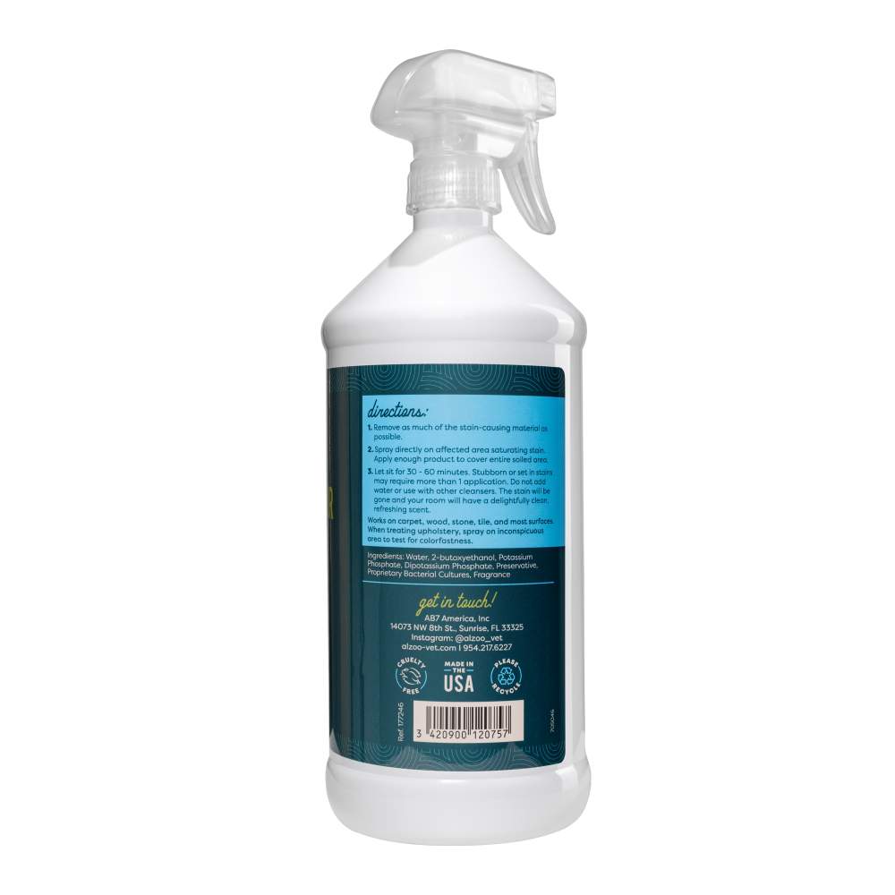 A side view of the ALZOO Enzyme-Based Stain & Odor Remover Spray 32oz - Apple Blossom bottle highlighting the directions for use and a list of ingredients