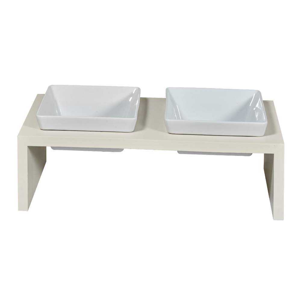 A sleek and modern pet feeder with two white bowls on a raised beige platform, known as the Bowsers Fresco Double Wood Feeder