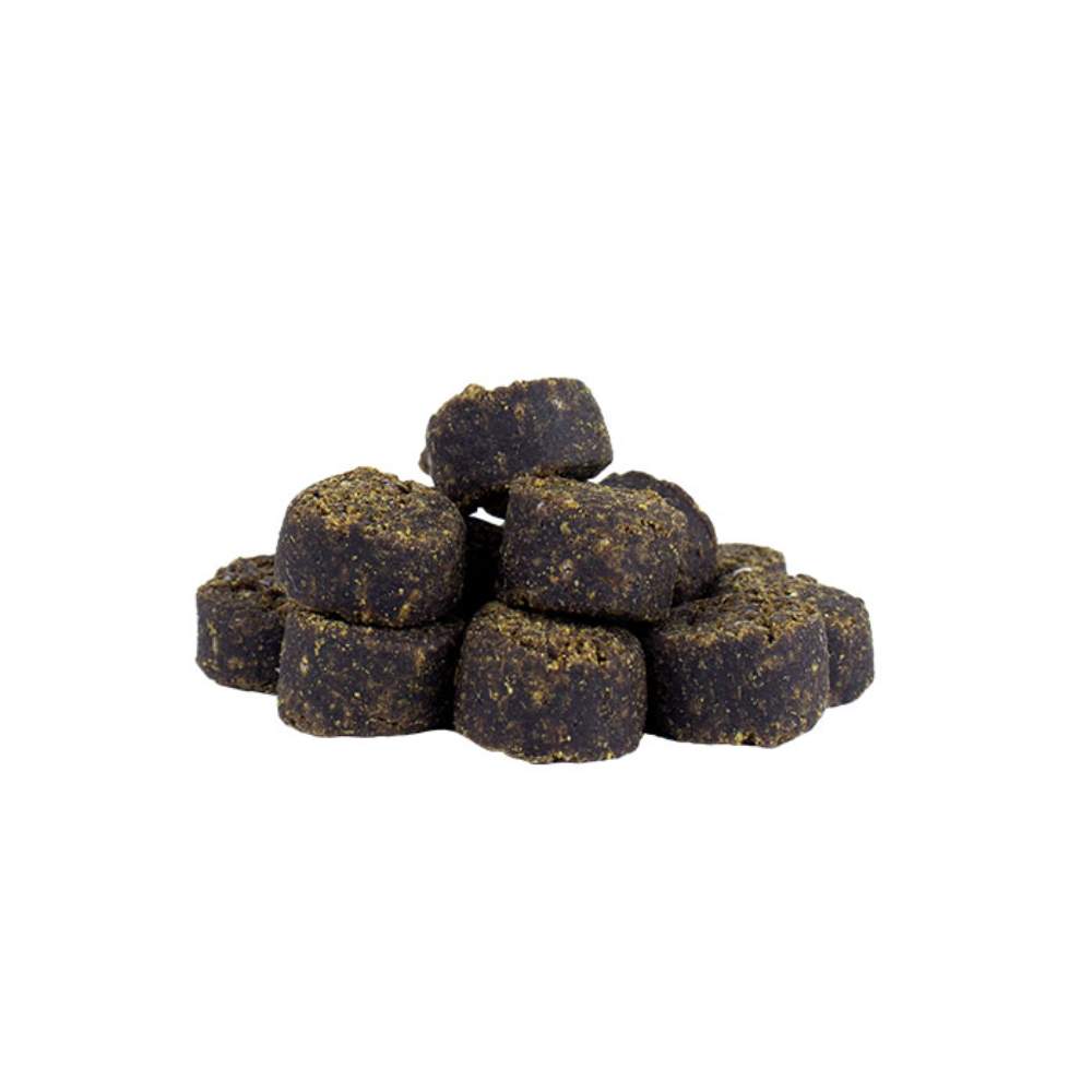 A small pile of individual ALZOO Plant-Based Calming Soft Chews stacked together