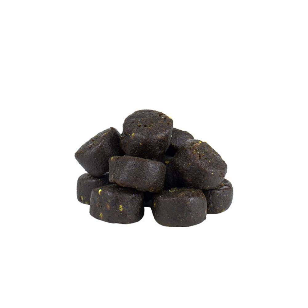 A small pile of the ALZOO Plant-Based Hip & Joint Soft Chews, highlighting their dark color and round shape