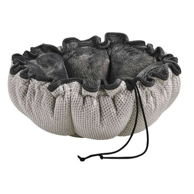 Aspen Bowsers Buttercup Dog Bed with cream knit fabric, dark gray plush cushioning, and a cozy gathered round design