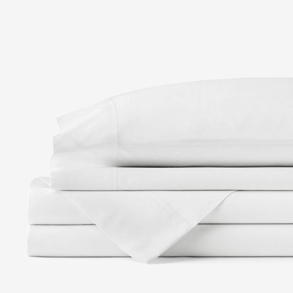 A stack of white folded bed sheets, emphasizing the Paw PupSheets™ Hair Resistant, Antimicrobial, & Cooling Bed Sheet Set - White