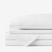 A stack of white folded bed sheets, emphasizing the Paw PupSheets™ Hair Resistant, Antimicrobial, & Cooling Bed Sheet Set - White