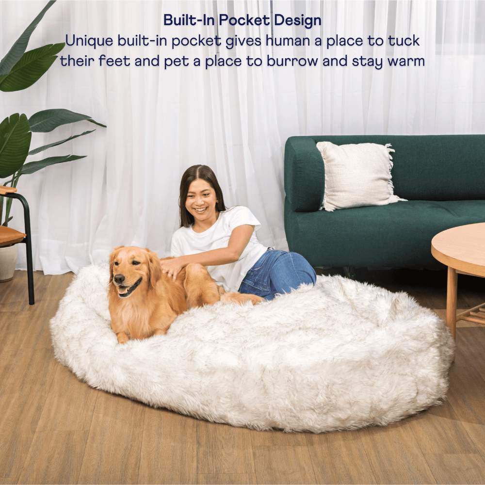 A unique built-in pocket design of the White with Brown Accents Paw PupCloud™ Human-Size Faux Fur Memory Foam Dog Bed