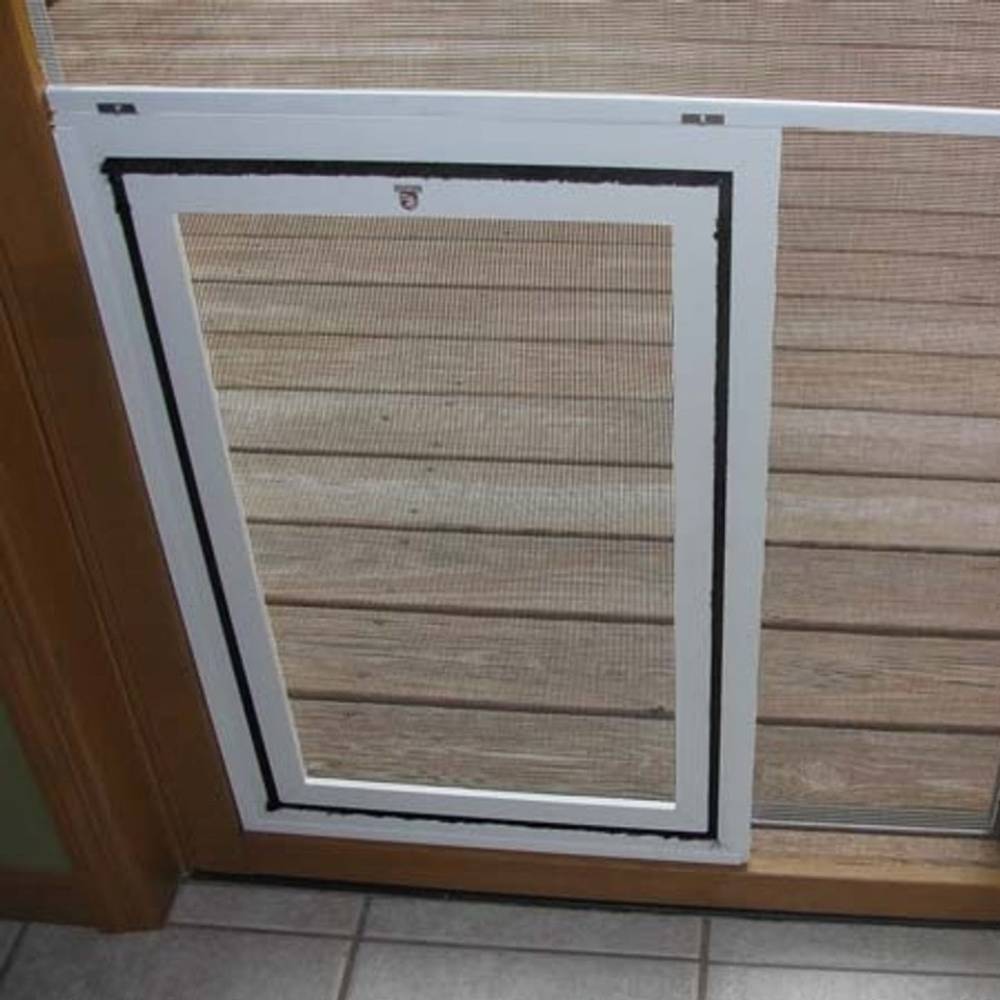 A white-framed screen door installed on a sliding door with a Security Boss Screen Door Brace Bar reinforcing the screen