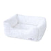 A white, rectangular, plush dog bed with soft, furry fabric. The label reads Hello Doggie Bella Dog Bed