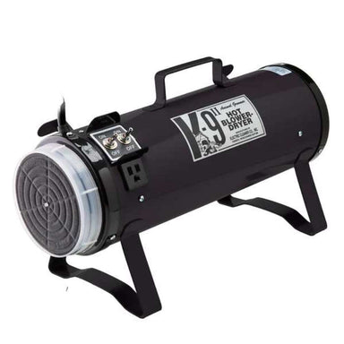 Black K-9 II Dog Dryer is a cylindrical pet dryer with metal legs, a carry handle, and a front air filter for grooming dogs