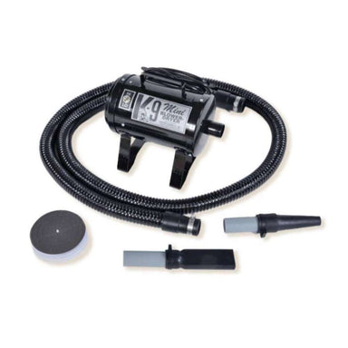 Black K-9 Mini Dog Dryer is a compact pet grooming dryer with a flexible hose, two nozzle attachments, and a round filter cover for quick drying
