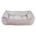 Blush Bowsers One Of A Kind Scoop Dog Bed is a soft pink bed with a velvety outer fabric and plush interior for gentle comfort