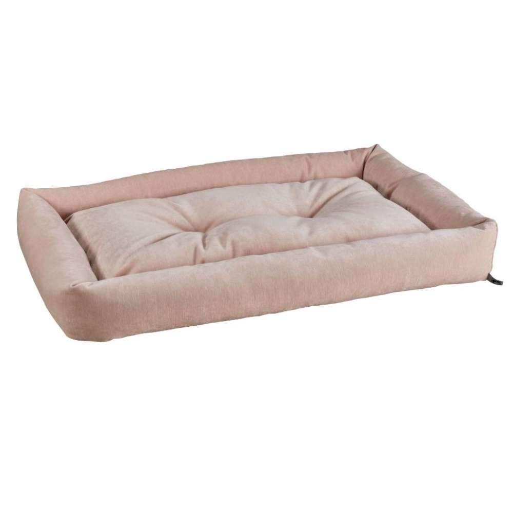 Blush Bowsers Tango Multi Dog Bed in blush pink has a soft tufted sleeping surface with padded bolsters