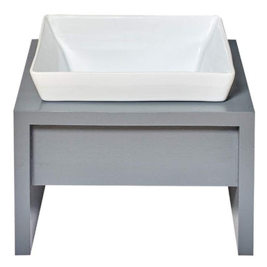 Bowsers Moderno Single Wood Feeder is displayed from the back with a white ceramic bowl on a grey wooden stand