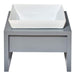 Bowsers Moderno Single Wood Feeder is displayed from the back with a white ceramic bowl on a grey wooden stand