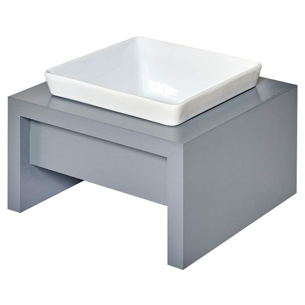 Bowsers Moderno Single Wood Feeder is presented from an angled view with a rectangular white ceramic bowl and a grey wooden platform