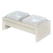 Bowsers Fresco Double Wood Feeder, a stylish raised feeding station with two square white bowls on a beige stand