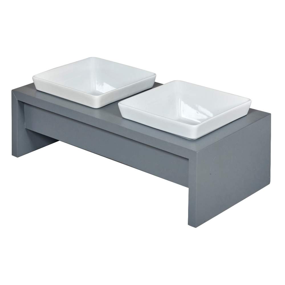Bowsers Moderno Double Wood Feeder is pictured from a side perspective with two square white ceramic bowls resting on a minimalist grey wooden base