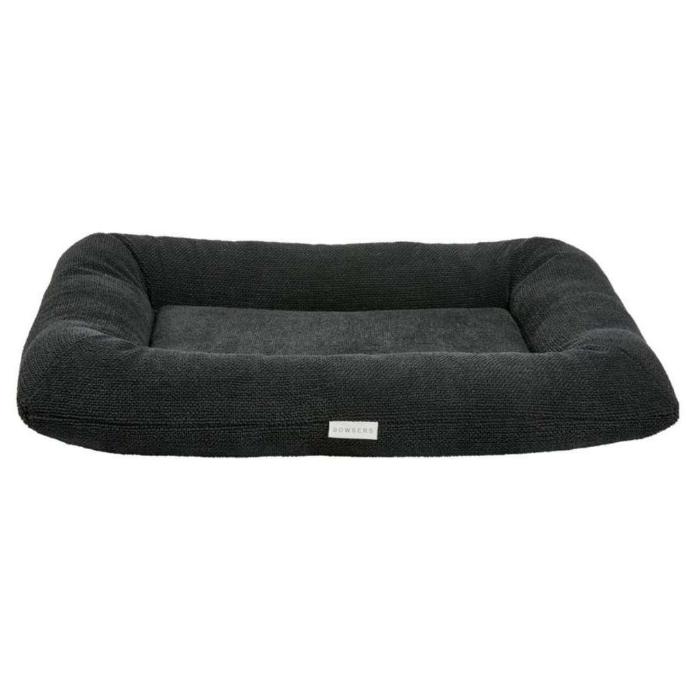 Chia Bowsers Hugo Futon Dog Bed features a black textured fabric with supportive raised edges and a padded sleeping area