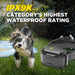 Close-up shows Dogtra iQ VIBE Dog Bark Control Collar with a sleek strap and compact receiver unit