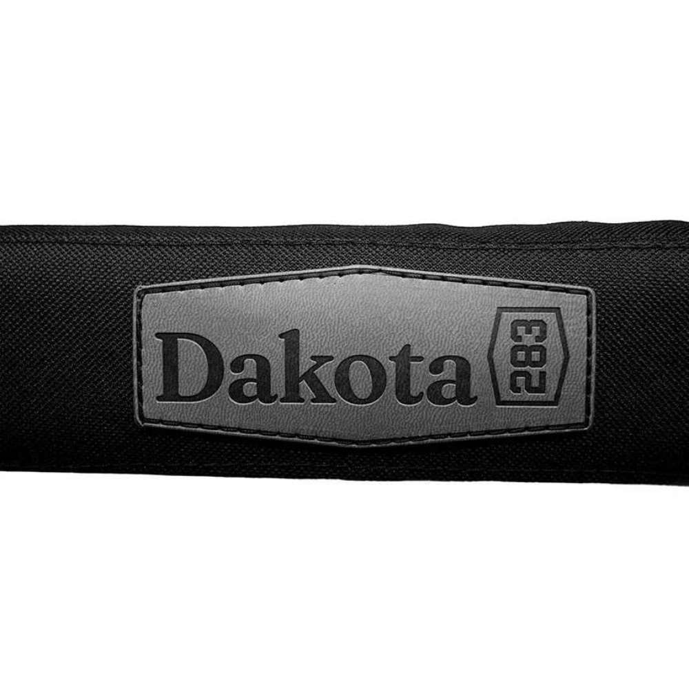 Close-up of the Dakota 283 G3 Kennel Mat logo patch stitched onto black fabric