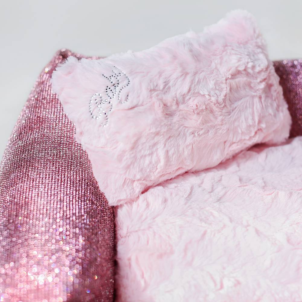 Close-up of the pink, fluffy pillow on the Hello Doggie Crystal Dog Bed, highlighting the crystal-embellished 'Baby' text on the pillow