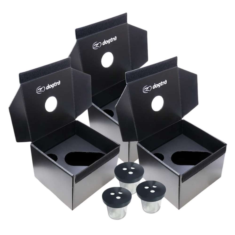 Dogtra 3 Ball Training Boxes & 3 Scent Cans shows three black dog training boxes with hinged lids, round scent holes, and three small scent cans in front