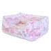 Featured in this image is the Hello Doggie Whisper Dog Bed in a vibrant fuchsia color