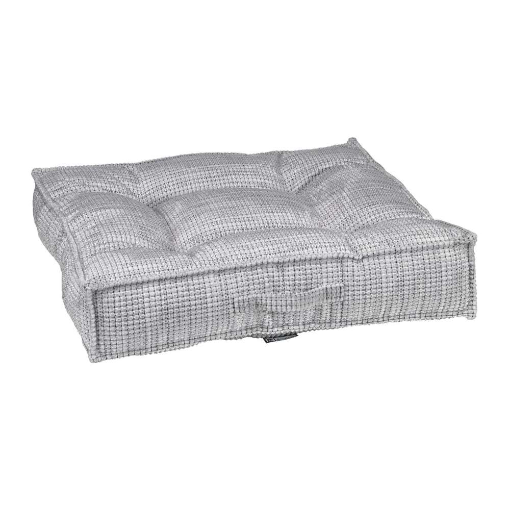 Glacier Bowsers Piazza Dog Bed in light gray textured fabric features a plush tufted cushion with thick padded edges for cozy comfort