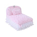 Hello Doggie Enchanted Nights Dog Bed in pink, showcasing a fluffy cushion, ruffled lace trim, and adorned with pink satin bows with crystal accents for a luxurious look