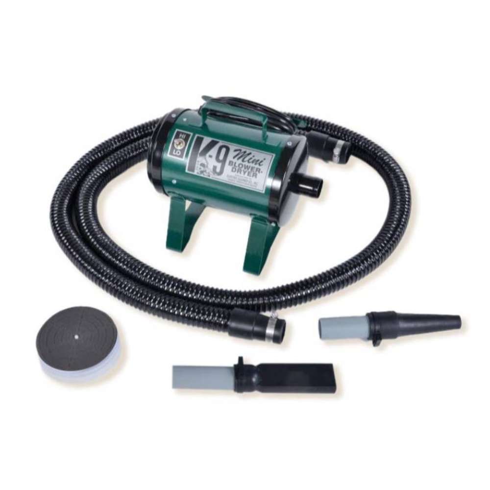Hunter Green K-9 Mini Dog Dryer features a dark green finish, flexible hose, and nozzle accessories designed for efficient pet coat drying
